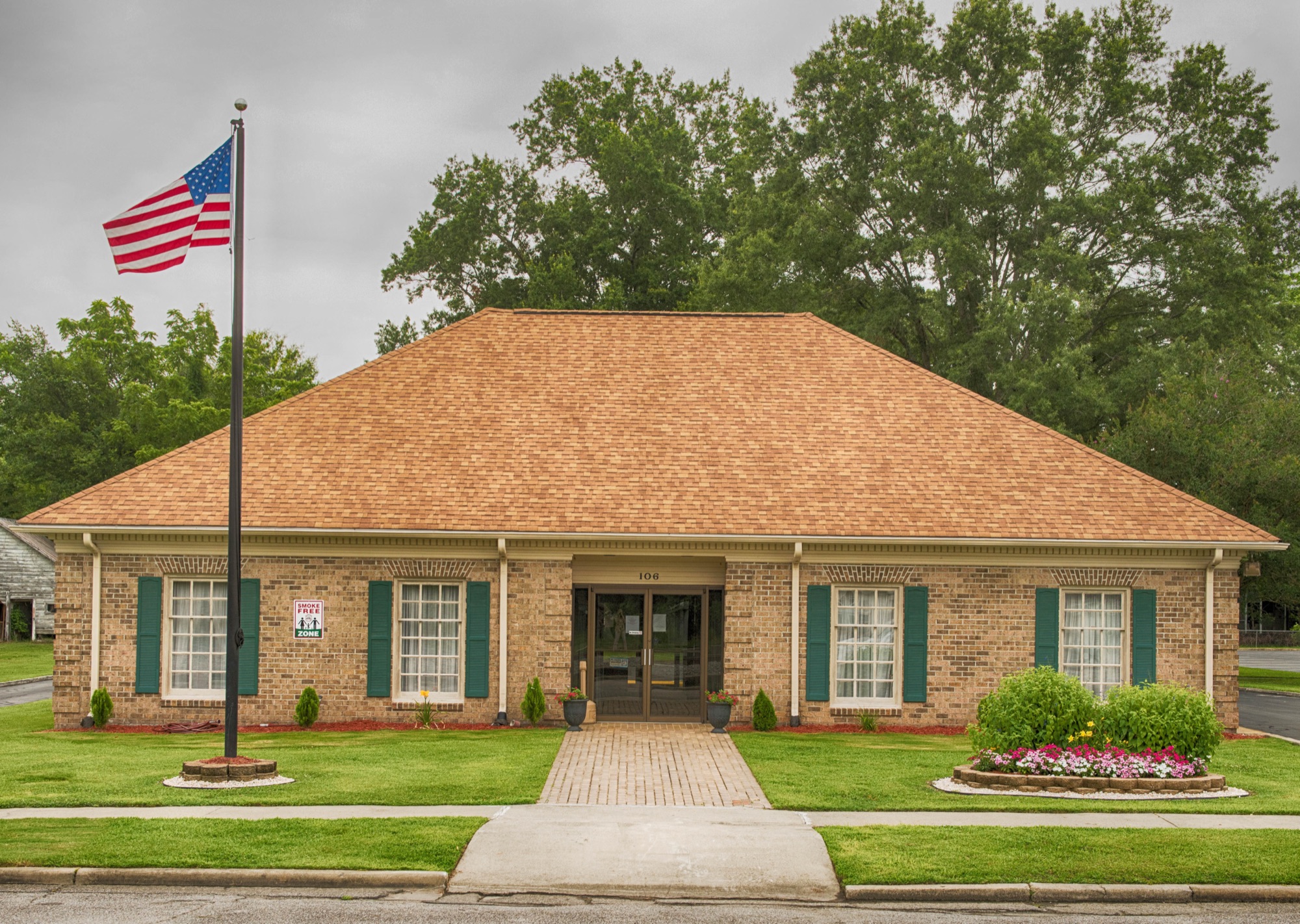 The Robersonville Housing Authority main office with its American flag and front walk
